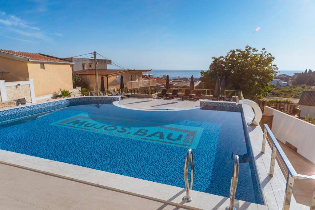Outdoor swimming pool at Hotel MS with sea views